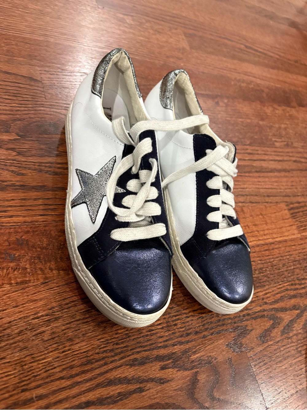Clean White Rubber Shoe Sole with 'Made in Italy' Plaque